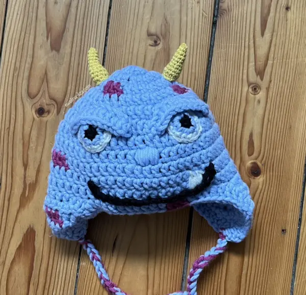 Crocheted baby hat with cute monsters designs. Merino wool baby hats- handmade by Ewelina Liza